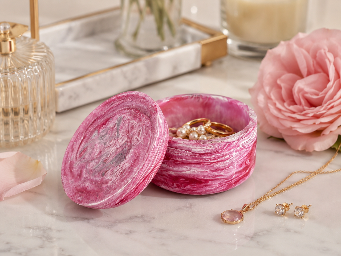 Handcrafted rose pink resin lidded trinket box with elegant marbled finish for jewelry and keepsakes.