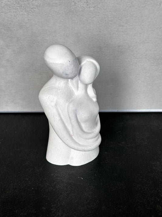 Handcrafted Enduring Embrace resin sculpture in soft white marbled finish by Stillflow Creations.