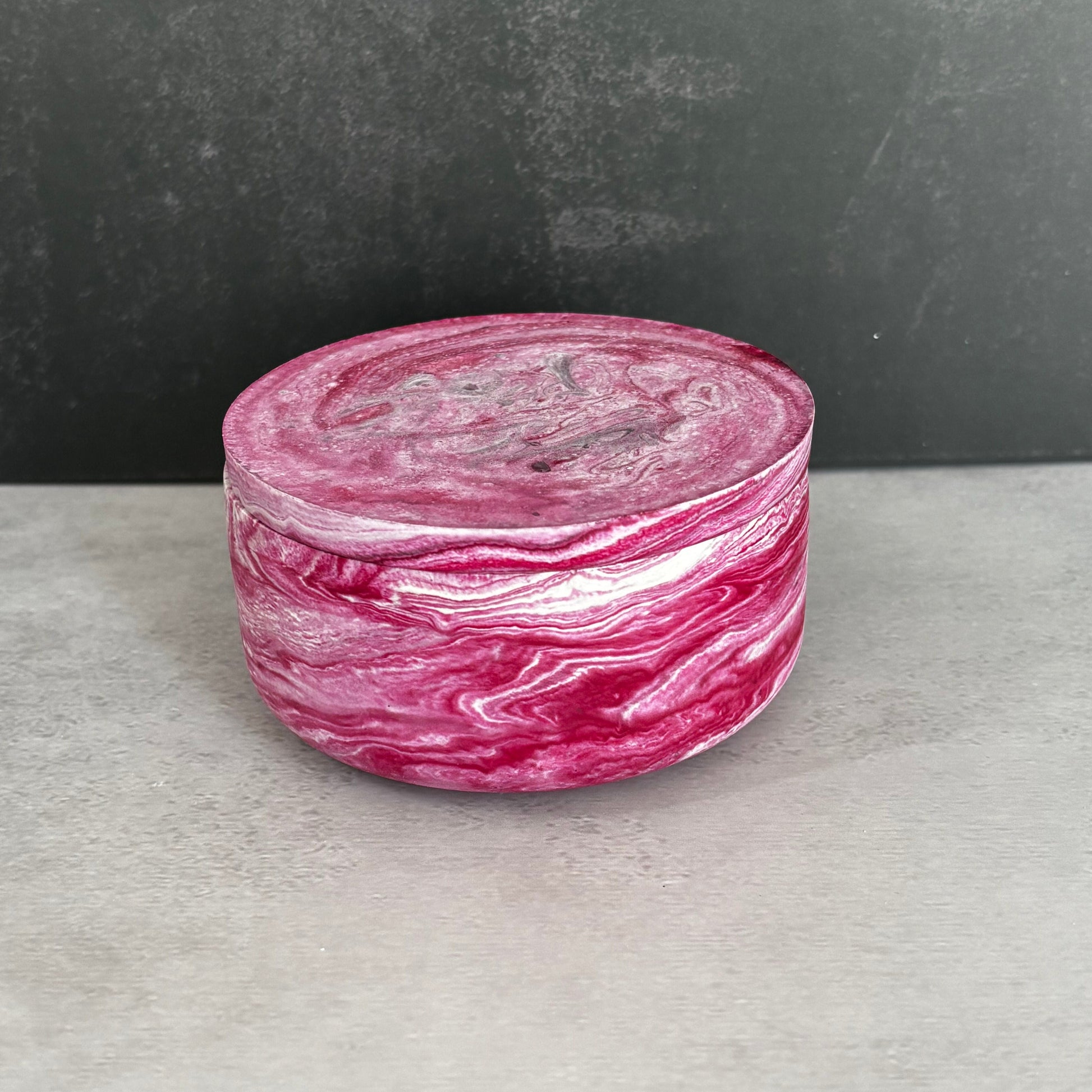 Handcrafted rose pink resin lidded trinket box with elegant marbled finish for jewelry and keepsakes.