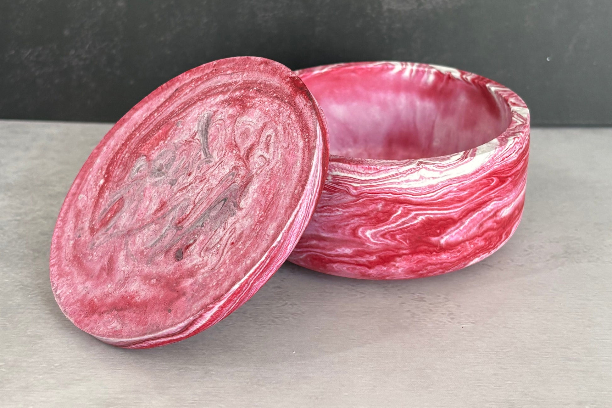 Handcrafted rose pink resin lidded trinket box with elegant marbled finish for jewelry and keepsakes.